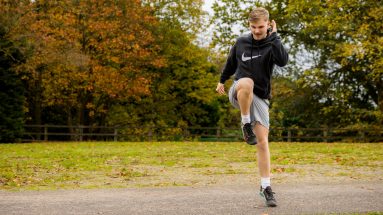 Male athlete performing plyometrics for running